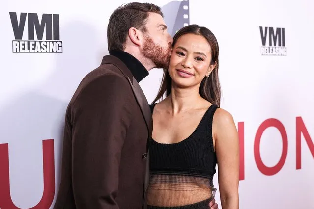 American actor Bryan Greenberg kisses his wife, actress Jamie Chung, on the cheek on January 25, 2024. Los Angeles Premiere Of VMI Releasing's “Junction” held at the Harmony Gold Theater on January 24, 2024 in Hollywood, Los Angeles, California, United States. (Photo by Xavier Collin/Image Press Agency/The Mega Agency)