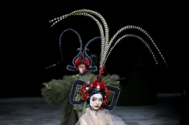 A model presents a creation by designer Hu Sheguang at China Fashion Week in Beijing, China, March 25, 2019. (Photo by Jason Lee/Reuters)