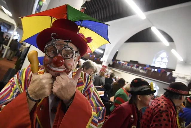 Clowns and entertainers gather to attend an annual service of remembrance in honour of British clown Joseph Grimaldi at All Saints Church in Haggerston in London, Britain, February 5, 2017. (Photo by Toby Melville/Reuters)