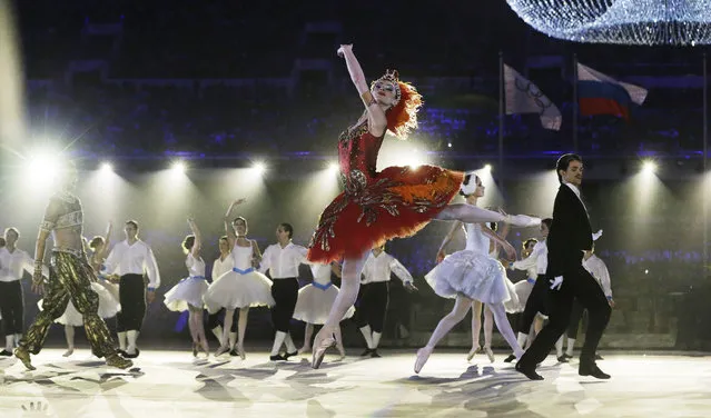 Performers dance during the closing ceremony of the 2014 Winter Olympics, Sunday, February 23, 2014, in Sochi, Russia. (Photo by Darron Cummings/AP Photo)