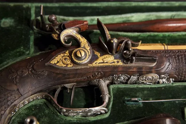 Details of a pistol set made by Versailles gunsmith Nicolas-Noel Boutet and was gifted to Simon Bolivar from Marquis de La-fayette are displayed at Christie's auction house in the Manhattan borough of New York, April 5, 2016. (Photo by Lucas Jackson/Reuters)