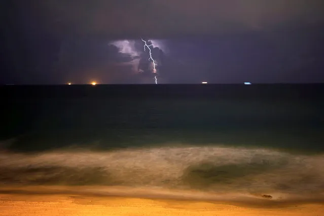Lightning strikes over the Mediterranean sea during a rain storm near the city of Ashkelon, Israel on November 14, 2018. (Photo by Amir Cohen/Reuters)