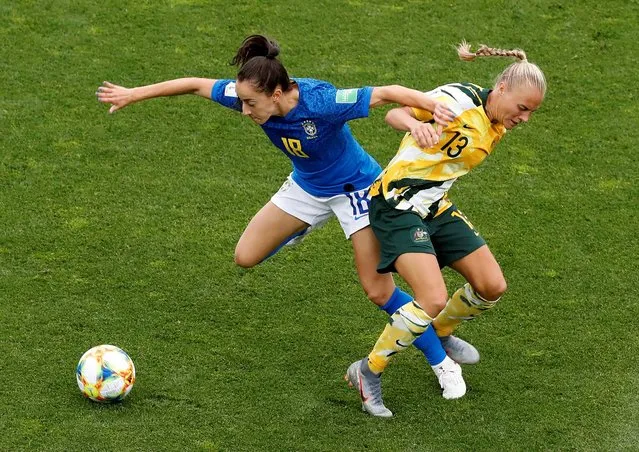 Brazil's Luana in action with Australia's Tameka Yallop during the Australia vs Brazil, Group C match at the FIFA Women's World Cup at Stade La Mosson Stadium on June 13th 2019 in Montpellier, France. (Photo by Eric Gaillard/Reuters)