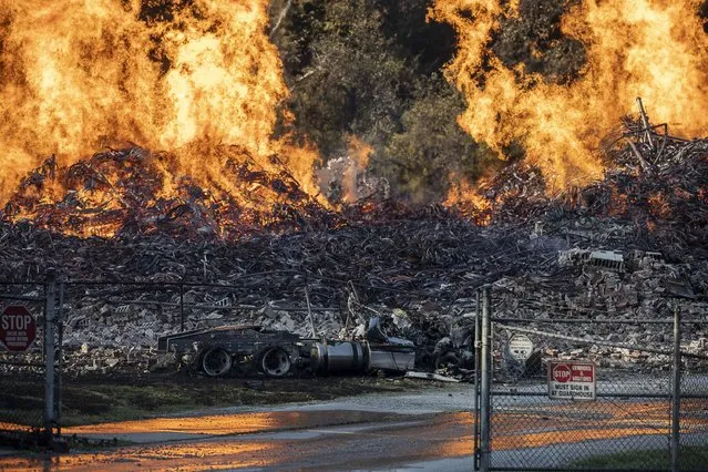 A Jim Beam bourbon warehouse burns on Wednesday, July 3, 2019 in Woodford County, Kentucky, USA after catching fire late Tuesday night. Two bourbon warehouses in caught fire. Each warehouse has around 40,000 barrels of bourbon and while flames were put out in one of them, the first warehouse continued to burn. (Photo by Ryan C. Hermens/ZUMA Press)