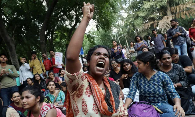 A student shouts slogans during a protest against the scrapping of the special constitutional status for Kashmir by the government, in New Delhi, India, August 8, 2019. (Photo by Anushree Fadnavis/Reuters)