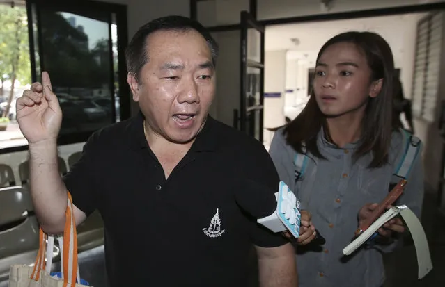 Sompong Puchongsopaphan, expert member of the Thai public prosecutor's office overseeing the 2012 hit-and-run case of Red Bull heir Vorayuth “Boss” Yoovidhya, walks past reporters without answering their questions at South Bangkok prosecutor's office in Bangkok, Thailand, Thursday, March 30, 2017.  An heir to the Red Bull fortune has won another delay in facing charges after an alleged hit and run that killed a police officer almost five years ago.  Vorayuth was scheduled to meet with the prosecutor's office on Thursday, but it agreed to his lawyer's request to postpone the meeting until April 27 because his client had something to attend to in England. (Photo by AP Photo)