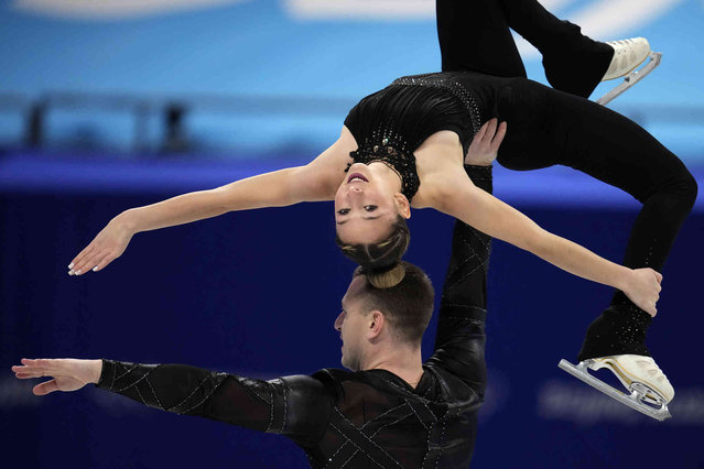 Hailey Kops and Evgeni Krasnopolski, of Israel, compete in the pairs short program during the figure skating competition at the 2022 Winter Olympics, Friday, February 18, 2022, in Beijing. (Photo by Natacha Pisarenko/AP Photo)