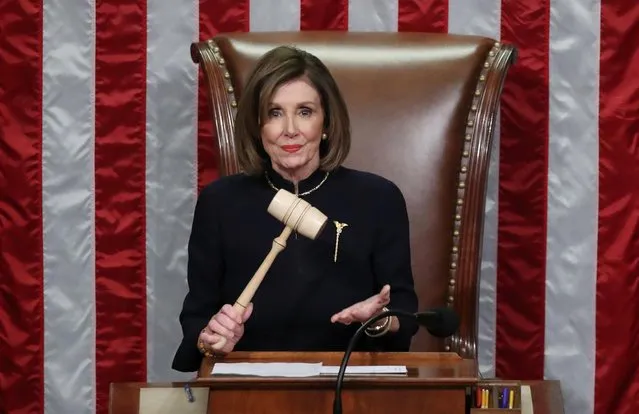 U.S. Speaker of the House Nancy Pelosi (D-CA) wields the Speaker's gavel as she presides over the final of two House of Representatives votes approving two counts of impeachment against U.S. President Donald Trump in the House Chamber of the U.S. Capitol in Washington, U.S., December 18, 2019. (Photo by Jonathan Ernst/Reuters)