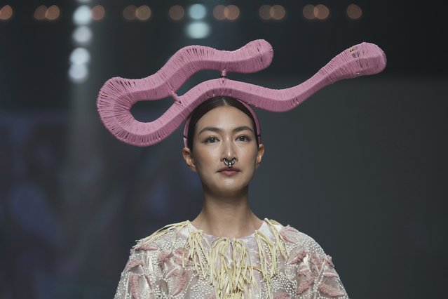 A model presents a creation as part of the Issue show, during Paragon Bangkok International Fashion Week in Thailand, Friday, October 4, 2024. (Phoot by Sakchai Lalit/AP Photo)