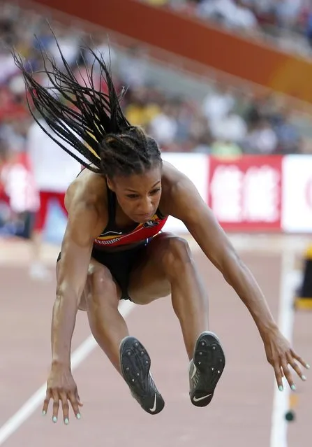 Nafissatou Thiam of Belgium competes in the long jump event of the women's heptathlon during the 15th IAAF World Championships at the National Stadium in Beijing, China, August 23, 2015. (Photo by Phil Noble/Reuters)