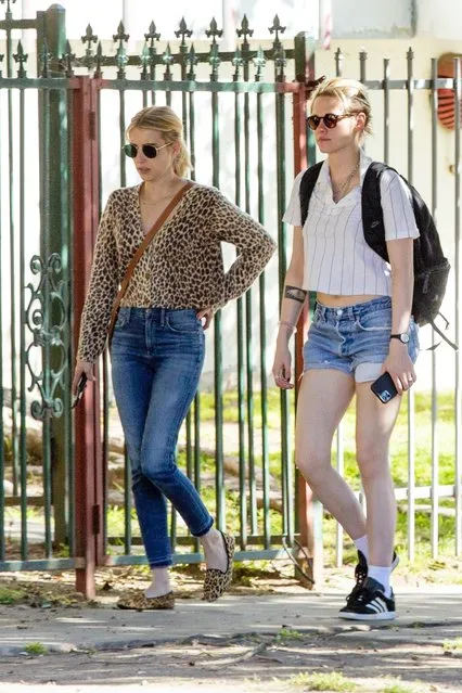 Actress friends Kristen Stewart and Emma Roberts arrive at Kristen's friend's new Los Feliz apartment on March 3, 2020. Kristen was helping her friend move things into the new place earlier and it looks like Emma is here to take a sneak peek at the place. (Photo by Backgrid USA)