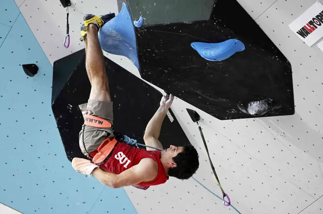 Switzerland's Sascha Lehmann competes during men's sport climbing lead qualification of the European Sport Climbing Championships in Munich, Germany, Friday, August 12, 2022. (Photo by Angelika Warmuth/dpa via AP Photo)