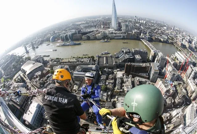 Rupert Atlkin, CEO of Talbot Undeerwriting abseils down the Walkie-Talkie during the Outward Bound Trust's and the Royal Navy and Royal Marines Charity's most daring stunt: The City Three Peaks Challenge on September 7, 2015 in London, England. (Photo by John Phillips/Getty Images for the Outward Bound Trust and the Royal Navy and Royal Marines Charity)