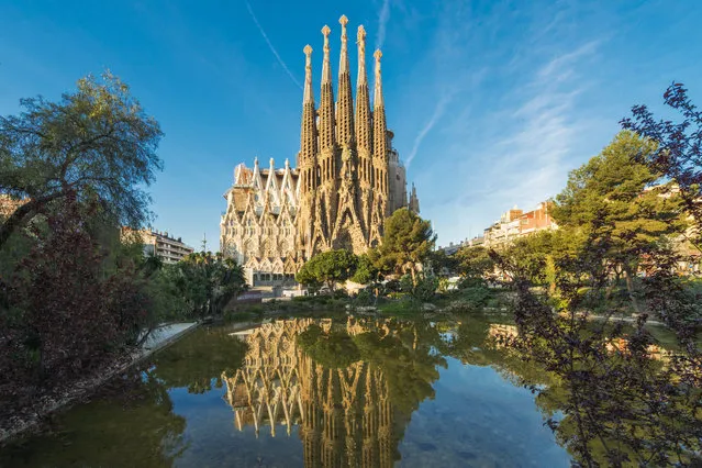 This whimsical cathedral is renowned as Antoni Gaudí’s principal architectural masterpiece. The design is so intricate that the cathedral was not finished in Gaudí’s lifetime; it has been under construction since 1882 and is scheduled to be finished in 2026, marking the centennial of Gaudí’s death. Don’t miss the incredible stained glass interior. (Photo by Tanatat Pongpibool/Getty Images)