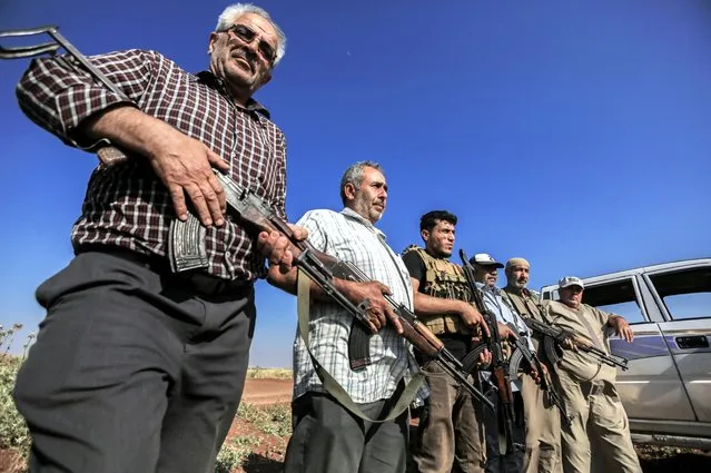 Syrian old citizens called the “Senior Squad” keep on the watch in Tell Rifaat, Syria on June 7, 2022. Senior Squad was established 10 years ago to fight against the Bashar al-Assad regime and the PKK, listed as a terrorist organization by Turkiye, US and EU, and the YPG, which Turkiye regards as a terror group organization. They give emotional support to Syrian National Army. (Photo by Omer Alven/Anadolu Agency via Getty Images)