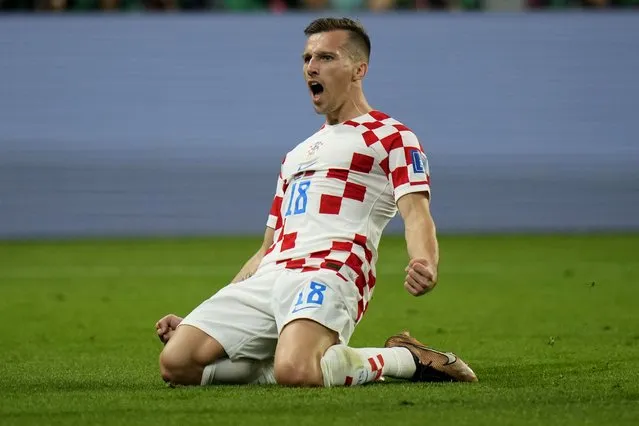 Croatia's Mislav Orsic celebrates after scoring his side's second goal during the World Cup third-place playoff soccer match between Croatia and Morocco at Khalifa International Stadium in Doha, Qatar, Saturday, December 17, 2022. (Photo by Francisco Seco/AP Photo)