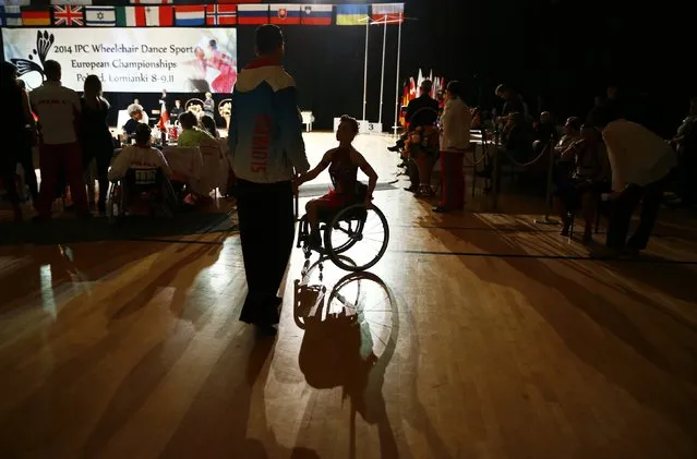 Maria Gazdikova and Maros Olejar of Slovakia practise before their start during IPC Wheelchair Dance Sport European Championships in Lomianki near Warsaw, November 9, 2014. (Photo by Kacper Pempel/Reuters)