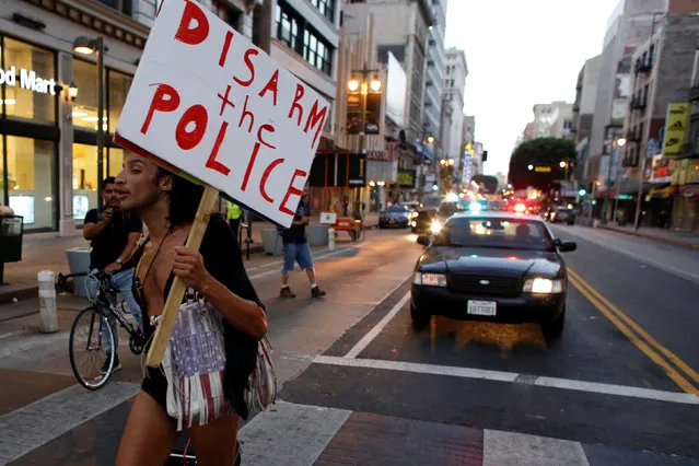 Queen Amor participates in a protest march against police violence, in Los Angeles, California, U.S., July 13, 2016. (Photo by Jonathan Alcorn/Reuters)