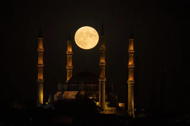 Full moon rises over Selimiye Mosque in Edirne, Turkey on September 2, 2020. (Photo by Gokhan Balci/Anadolu Agency via Getty Images)