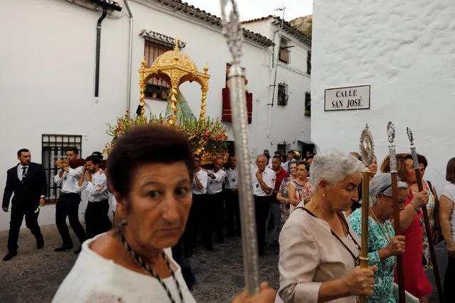 Members of the Virgin of los Angeles brotherhood take part during a procession in the white village of Grazalema, southern Spain September 8, 2016. (Photo by Marcelo del Pozo/Reuters)