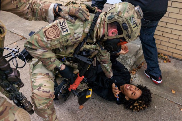 A U.S. Customs and Border Protection agent detains a protester in East Side, Chicago, Tuesday, October 14, 2025. (Photo by Anthony Vazquez/Chicago Sun-Times via AP Photo)