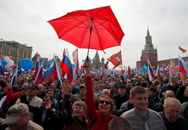 People attend a May Day rally at Red Square in Moscow, Russia on May 1, 2018. (Photo by Maxim Shemetov/Reuters)