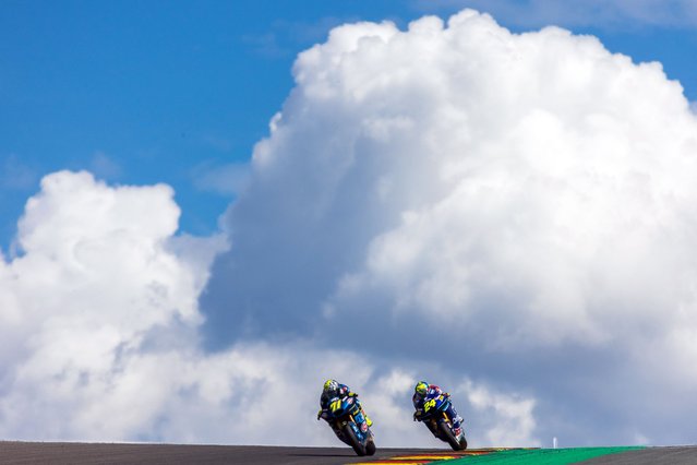Italtrans Racing Team's Italian rider Dennis Foggia (71) races ahead of OnlyFans American Racing Team's Spanish rider Marcos Ramirez (24) during the second qualifying session of the Moto2 category during the German Motorcycle Grand Prix at the Sachsenring racetrack in Hohenstein-Ernstthal, eastern Germany, on July 6, 2024. (Photo by Radek Mica/AFP Photo)