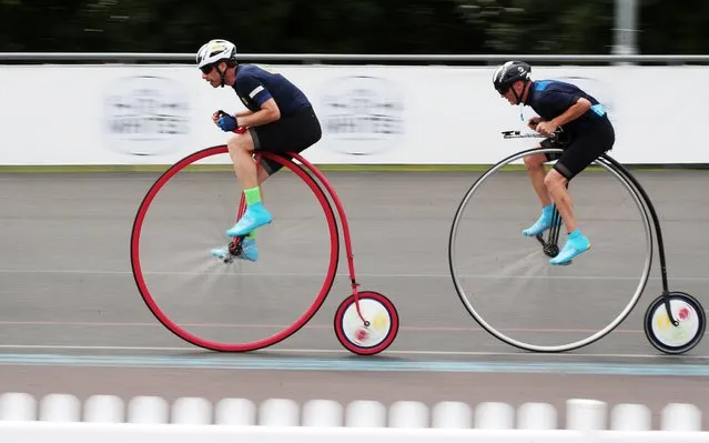Record-breaking long-distance cyclist Mark Beaumont has broken a 127-year British Record on a Penny Farthing bike. The R.White’s Lemonade Penny Farthing One Hour British Record took place on June 15, 2018 at the “World Cycling Revival” festival in Herne Hill, London, UK. Beaumont beat the 21 miles and 180 yards British Record, which was set in 1891 at the same Herne Hill location, and Beaumont cycled 21 miles1616 yards in the hour. British lemonade brand R.White’s is behind all penny farthing activities at the World Cycling Revival three day festival in celebration of its Victorian heritage, which dates back to 1845. The brand supported the headline event, as well as offering penny farthing rides to festival-goers. (Photo by Joe Pepler/PinPepWENN.com)
