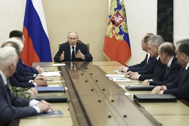 Russian President Vladimir Putin chairs a meeting with the heads of Russian law enforcement agencies at the Kremlin in Moscow, Russia, Monday, June 26, 2023. (Photo by Valery Sharifulin, Sputnik, Kremlin Pool Photo via AP Photo)