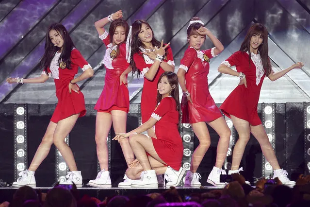 In this October 6, 2013, file photo, South Korean K-Pop girl group Apink performs during Hallyu Dream Concert in Gyeongju, South Korea. South Korea is trying to get under the skin of its archrival with border broadcasts that feature not only criticism of North Korea's nuclear program, troubled economy and human rights abuses, but also a unique homegrown weapon: K-pop. “Just Let Us Love” by a popular female group Apink is one of the songs being broadcast across the Demilitarized Zone between North and South Korea. (Photo by Ahn Young-joon/AP Photo)
