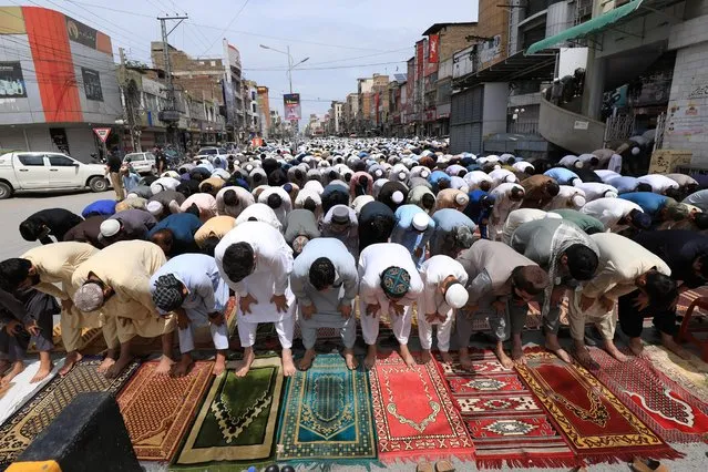 Muslims take part in Friday prayer as part of Ramadan in Peshawar, Pakistan, April 16, 2021. (Photo by Fayaz Aziz/Reuters)