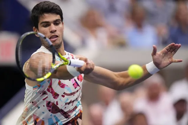 Carlos Alcaraz, of Spain, returns to Matteo Arnaldi, of Italy, during the fourth round of the U.S. Open tennis championships, Monday, September 4, 2023, in New York. (Photo by Manu Fernandez/AP Photo)