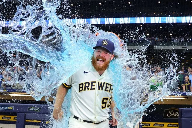 Brandon Woodruff #53 of the Milwaukee Brewers is doused following a game against the Miami Marlins at American Family Field on September 11, 2023 in Milwaukee, Wisconsin. (Photo by Stacy Revere/Getty Images)