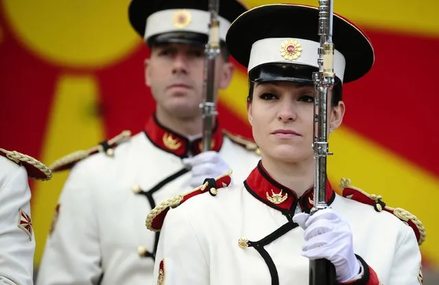 Corporal Dragana Kitanovska attends an honour guard training session at an army barracks in Skopje March 4, 2015. Macedonia's honour army battalion, the ceremonial uniformed guard that receives every foreign president, dignitaries and delegations, but also sees off and welcomes the head of state every time he leaves the country, has a different glow. For the first time in the history of Macedonia's army, the honour guard has two women in its ranks. There has not been an event in which one of them is not in the first row. Verica Zlatevska joined the army in 2003, Kitanovska in 2006. Picture taken March 4, 2015.    REUTERS/Ognen Teofilovski (MACEDONIA - Tags: MILITARY SOCIETY)