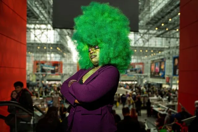 An attendee dressed as She-Hulk poses during New York Comic Con at the Jacob K. Javits Convention Center on Thursday, October 12, 2023, in New York. (Photo by Charles Sykes/Invision/AP Photo)