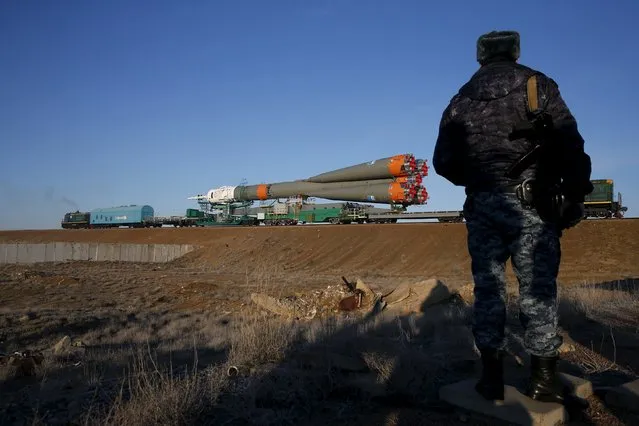 The Soyuz TMA-16M spacecraft is transported to its launch pad at the Baikonur cosmodrome March 25, 2015. (Photo by Maxim Zmeyev/Reuters)