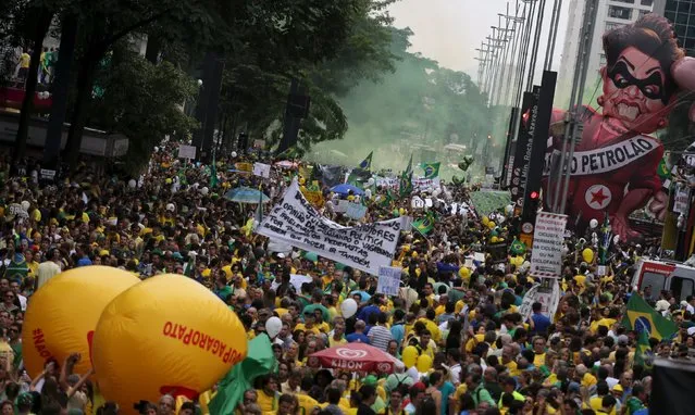 Demonstrators attend a protest against Brazil's President Dilma Rousseff, part of nationwide protests calling for her impeachment, in Sao Paulo, Brazil, March 13, 2016. (Photo by Nacho Doce/Reuters)