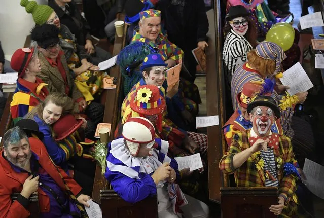 Clowns and entertainers gather to attend an annual service of remembrance in honour of British clown Joseph Grimaldi at All Saints Church in Haggerston in London, Britain, February 5, 2017. (Photo by Toby Melville/Reuters)