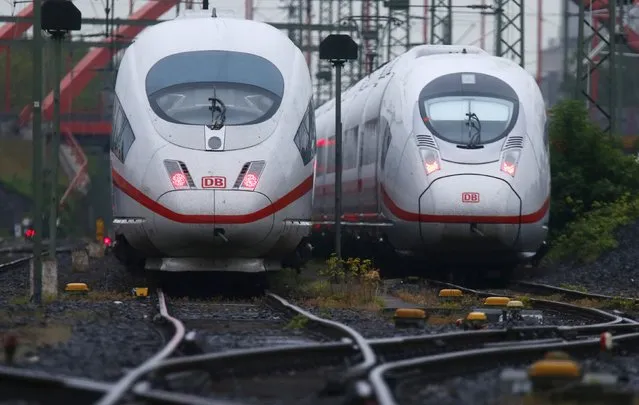 Trains stand on the tracks during a nationwide strike by Germany's train driver's union GDL at Frankfurt train station, Germany, May 5, 2015. A record-setting seven-day strike by the GDL union of train drivers began on Monday, the eighth in a series of walkouts over pay and working conditions, threatening commuter chaos and disruption to vital supply chains. (Photo by Ralph Orlowski/Reuters)