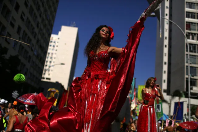 Revellers take part in the annual block party Cordao de Boitata during pre-carnival festivities in Rio de Janeiro, Brazil February 19, 2017. (Photo by Pilar Olivares/Reuters)