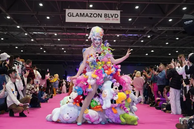 Drag queens take part in a catwalk show during the official opening of at RuPaul's DragCon UK, at ExCel London on Friday, January 6, 2023. (Photo by Ian West/PA Images via Getty Images)