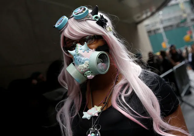 A fan of the Japanese visual kei rock band “The Gazette” waits outside a music venue in Manhattan, New York, U.S., April 29, 2016. (Photo by Shannon Stapleton/Reuters)