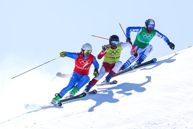 (L-R) Simone Deromedis of Team Italy, Adam Kappacher of Team Austria and Bastien Midol of Team France compete during the Men's Ski Cross 1/8 Finals on Day 14 of the Beijing 2022 Winter Olympics at Genting Snow Park on February 18, 2022 in Zhangjiakou, China. (Photo by Clive Rose/Getty Images)