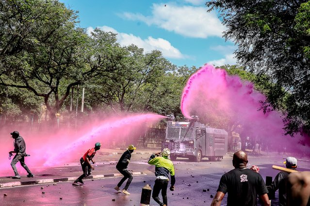 The Kenyan Anti-riot police used tear gas and water cannons to disperse demonstrators during protests against the current government's finance bill on June 25, 2024 in Nairobi, Kenya. Last week saw several days of protests, mainly by young Kenyans, against a proposed finance bill that promises to raise taxes on a variety of goods. The outcry spurred the government to withdraw several contentious provisions, including taxes on bread and vehicles, but the bill passed a second-round vote and a parliamentary committee is now considering amendments. (Photo by Donwilson Odhiambo/Getty Images)