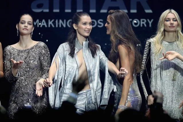 (L-R) Barbara Palvin, Bella Hadid, Izabel Goulart and Jessica Hart appear on stage at the amfAR's 23rd Cinema Against AIDS Gala at Hotel du Cap-Eden-Roc on May 19, 2016 in Cap d'Antibes, France. (Photo by Andreas Rentz/Getty Images)