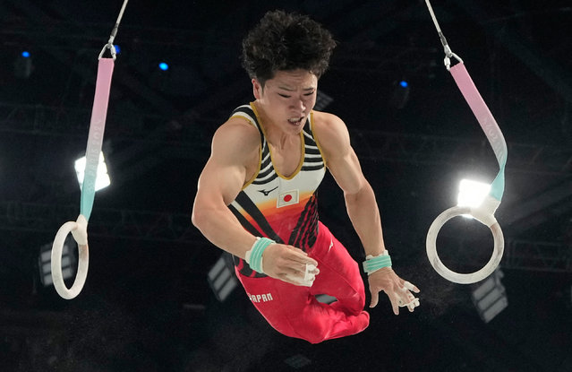 Shinnosuke Oka, of Japan, dismounts the rings during the men's artistic gymnastics all-around finals in Bercy Arena at the 2024 Summer Olympics, Wednesday, July 31, 2024, in Paris, France. (Photo by Abbie Parr/AP Photo)