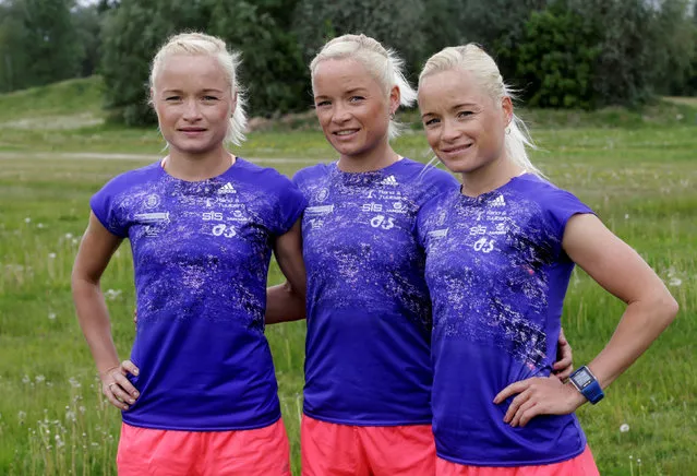 Estonia's olympic team female marathon runners triplets (L-R) Leila, Liina and Lily Luik pose for a picture after a training session in Tartu, Estonia, May 26, 2016. (Photo by Ints Kalnins/Reuters)