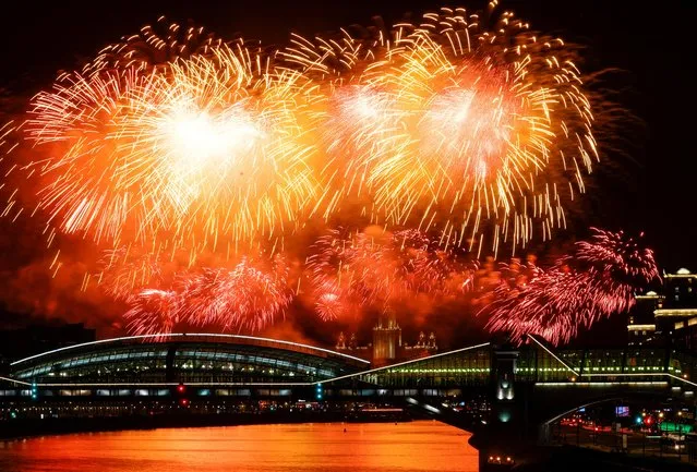 Fireworks explode on Victory Day, which marks the 77th anniversary of the victory over Nazi Germany in World War Two, in Moscow, Russia on May 9, 2022. (Photo by Evgenia Novozhenina/Reuters)