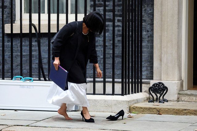 Britain's Lord Chancellor and Secretary of State for Justice Shabana Mahmood goes to retrieve her shoe after losing it from her foot, outside 10 Downing Street, in London, Britain, on September 9, 2024. (Photo by Toby Melville/Reuters)