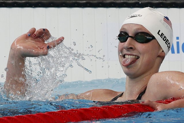 Katie Ledecky from U.S. celebrates after setting a new World Record in the women's 1500m freestyle heats at the Aquatics World Championships in Kazan, Russia August 3, 2015. (Photo by Stefan Wermuth/Reuters)